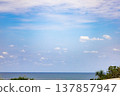 The refreshing blue skies and blue seas of the tropics, and the coral reefs and coral shores of Miyako Blue as viewed from the golf course (Miyako Island, Okinawa Prefecture) 137857947