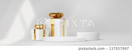 White podium with gift boxes, golden ribbon bow 137857997
