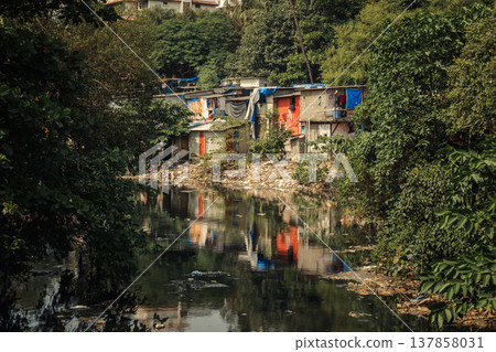 Big slums in the Mumbai, India. Streets full of people Big slums in the Mumbai, India. Streets full of people 137858031