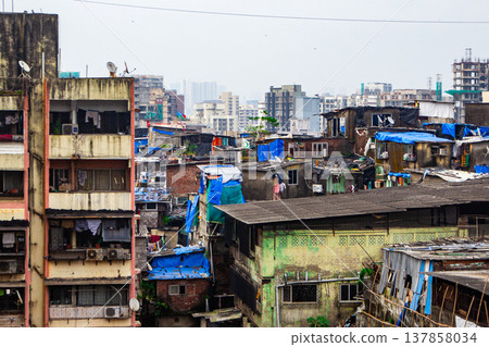 Big slums in the Mumbai, India. Streets full of people Big slums in the Mumbai, India. Streets full of people 137858034