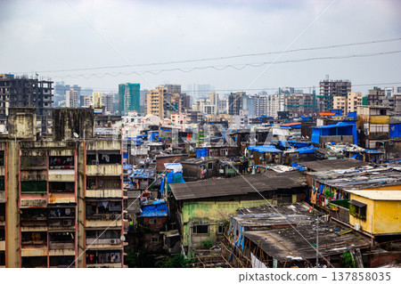 Big slums in the Mumbai, India. Streets full of people Big slums in the Mumbai, India. Streets full of people 137858035