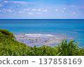 The refreshing blue skies and blue seas of the tropics, and the Miyako Blue coastline with its coral reefs and coral groves viewed from Higashi-Hennazaki Cape (Miyako Island, Okinawa Prefecture) 137858169