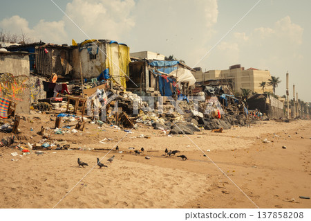 Slum area on the beach in the Mumbai, India Slum area on the beach in the Mumbai, India 137858208