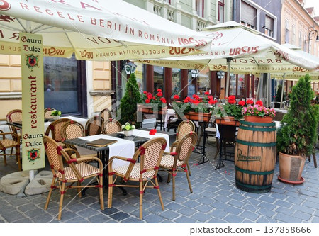 Romania, Transylvania, Brașov, Apollonia Hirskel Street, a street corner restaurant Romania, Transylvania, Brașov, Apollonia Hirskel Street, a street corner restaurant 137858666