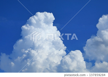 A refreshing blue sky and towering cumulonimbus clouds (a summer sky image) A refreshing blue sky and towering cumulonimbus clouds (a summer sky image) 137859284