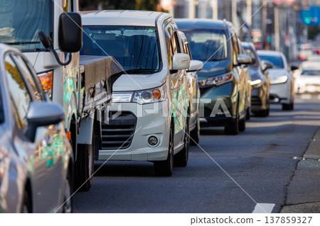 Congested lines of cars on public roads Congested lines of cars on public roads 137859327