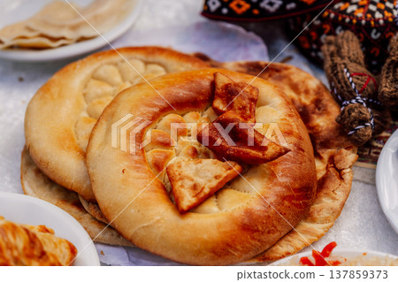 Colorful Array Of Rustic Breads With Intricate Decorations In Lively Market Setting Colorful Array Of Rustic Breads With Intricate Decorations In Lively Market Setting 137859373