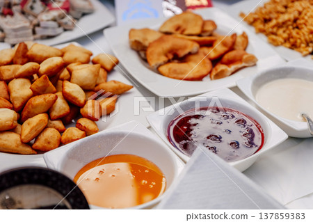 Uzbek flour treats with jam. fried baursaks on the Uzbek holiday Nauryz 137859383