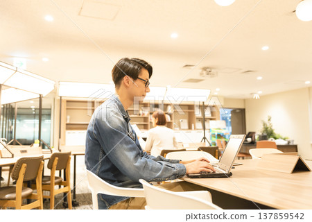 Business person working in a rental office Business person working in a rental office 137859542