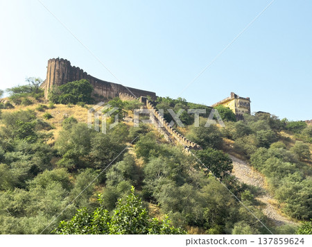 Hilltop view of Jaigarh Fort with a long defensive wall and stairway running across the Aravalli 137859624