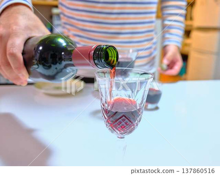 man pouring wine man pouring wine 137860516