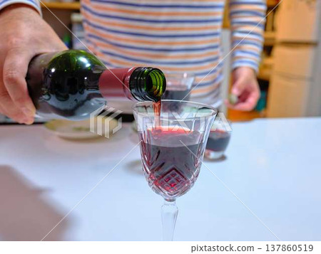 man pouring wine man pouring wine 137860519