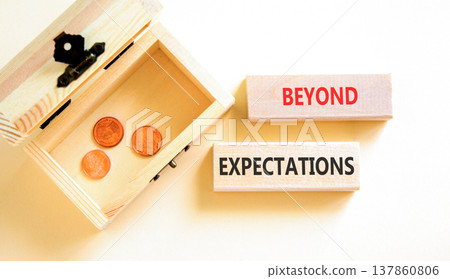 Beyond expectations words symbol. Concept words Beyond expectations on beautiful blocks. Beautiful white background. Wooden chest with coins. Business and Beyond expectations words concept. Copy space 137860806