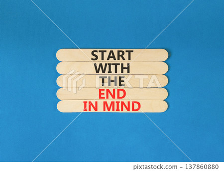 Start with the end in mind symbol. Concept words Start with the end in mind on beautiful wooden sticks. Beautiful blue paper background. Business start with the end in mind concept. Copy space. Start with the end in mind symbol. Concept words Start with the end in mind on beautiful wooden sticks. Beautiful blue paper background. Business start with the end in mind concept. Copy space. 137860880