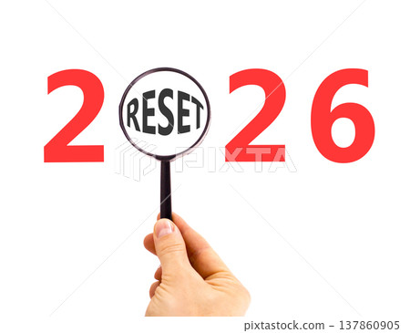 2026 reset symbol. Concept words 2026 reset in beautiful magnifying glass. Beautiful white background. Businessman's hand. Business 2026 reset concept. Copy space. 2026 reset symbol. Concept words 2026 reset in beautiful magnifying glass. Beautiful white background. Businessman's hand. Business 2026 reset concept. Copy space. 137860905