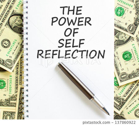 Self reflection symbol. Concept words The power of self reflection on beautiful white note. Beautiful dollar bills background. Dollar bills. Business the power of self reflection concept. Copy space. 137860922