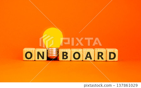 Onboard and onboarding symbol. The concept word Onboard on wooden cubes. Beautiful orange background. Beautiful yellow light bulb. Copy space. Business onboard and onboarding concept. Onboard and onboarding symbol. The concept word Onboard on wooden cubes. Beautiful orange background. Beautiful yellow light bulb. Copy space. Business onboard and onboarding concept. 137861029