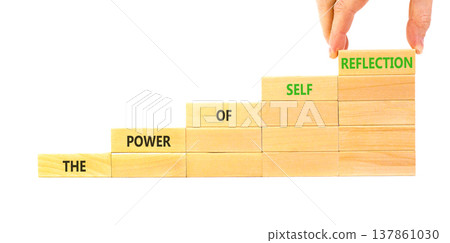 Self reflection symbol. Concept words The power of self reflection on beautiful wooden blocks. Beautiful white background. Businessman hand. Business the power of self reflection concept. Copy space. Self reflection symbol. Concept words The power of self reflection on beautiful wooden blocks. Beautiful white background. Businessman hand. Business the power of self reflection concept. Copy space. 137861030