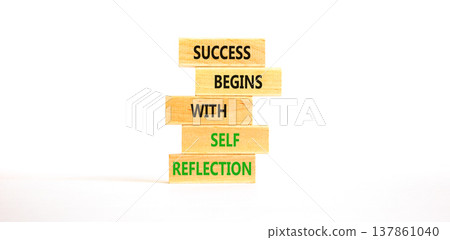 Self reflection symbol. Concept words Success begins with self reflection on beautiful wooden blocks. Beautiful white paper background. Business success begins with self reflection concept. Copy space 137861040