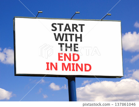 Start with the end in mind symbol. Concept words Start with the end in mind on beautiful white billboard. Beautiful blue sky background. Business start with the end in mind concept. Copy space. 137861046