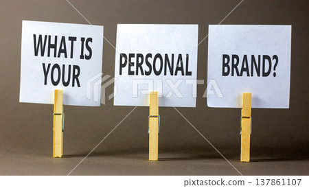 What is your personal brand symbol. Concept words What is your personal brand on beautiful white papers. Beautiful grey background. Business what is your personal brand concept. Copy space. What is your personal brand symbol. Concept words What is your personal brand on beautiful white papers. Beautiful grey background. Business what is your personal brand concept. Copy space. 137861107