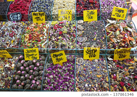 An assortment of various herbal teas, dried flowers and fruit infusions on the market 137861346