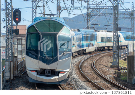 Kintetsu Shimakaze passing through a curve Kintetsu Shimakaze passing through a curve 137861811