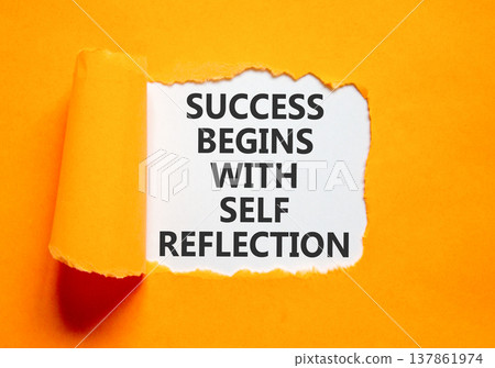 Self reflection symbol. Concept words Success begins with self reflection on beautiful white paper. Beautiful orange paper background. Business success begins with self reflection concept. Copy space. 137861974