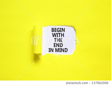 Begin with the end in mind symbol. Concept words Begin with the end in mind on beautiful white paper. Beautiful yellow paper background. Business begin with the end in mind concept. Copy space. Begin with the end in mind symbol. Concept words Begin with the end in mind on beautiful white paper. Beautiful yellow paper background. Business begin with the end in mind concept. Copy space. 137862006