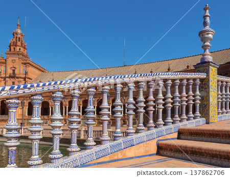 Ceramic bridge and Plaza de Espana in Seville under blue sky Spain 137862706