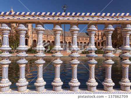 Ceramic bridge and Plaza de Espana in Seville under blue sky Spain 137862709