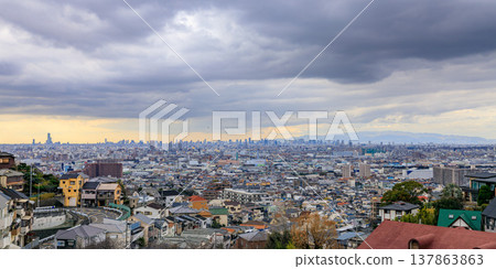 Panoramic view of the Osaka Plain under a cloudy sky from in front of Ishikiri Station, January 18, 2023. 137863863