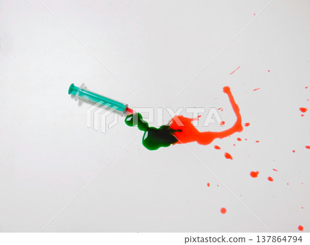 Syringe Pouring Green Paint Into Red Smear On White Surface, Color Mixing In Motion, Viscous Liquids Merging Syringe Pouring Green Paint Into Red Smear On White Surface, Color Mixing In Motion, Viscous Liquids Merging 137864794