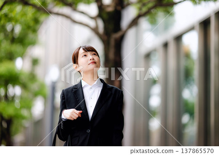 A woman in a suit 137865570