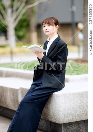 A woman in a suit A woman in a suit 137865590
