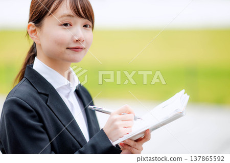 A woman in a suit A woman in a suit 137865592