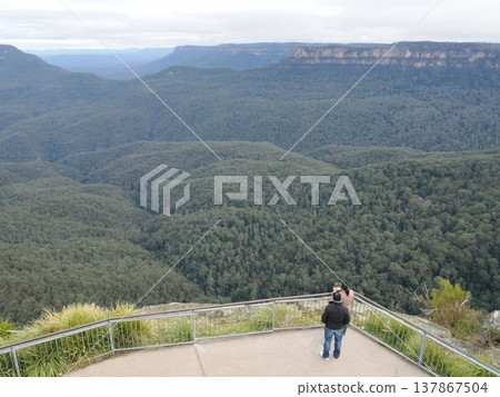 The magnificent natural scenery viewed from the Blue Mountains lookout – deep valleys and sprawling greenery. The magnificent natural scenery viewed from the Blue Mountains lookout – deep valleys and sprawling greenery. 137867504