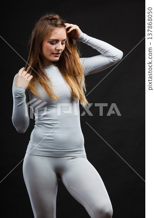 Woman wearing thermoactive underwear. Woman wearing thermoactive underwear. 137868050