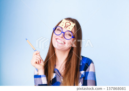 woman thinking light idea bulb on head, creative girl lots of ideas woman thinking light idea bulb on head, creative girl lots of ideas 137868081