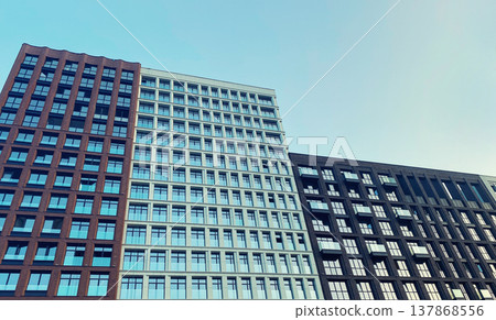 Architecture and real estate, modern residential apartment building with large panoramic windows Architecture and real estate, modern residential apartment building with large panoramic windows 137868556