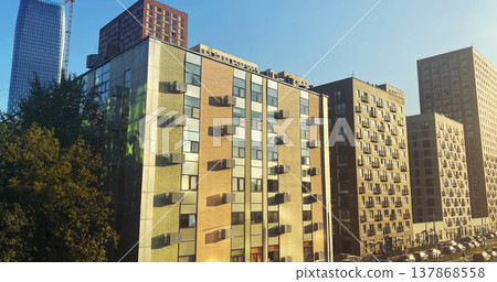 Architecture and real estate, modern residential apartment building with large panoramic windows Architecture and real estate, modern residential apartment building with large panoramic windows 137868558
