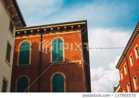 Beautiful old buildings on Verona street, Italy. Amazing blue sky. Beautiful old buildings on Verona street, Italy. Amazing blue sky. 137868578