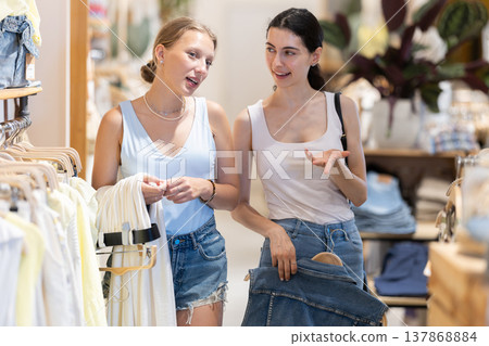 Women came shopping in a clothing store Women came shopping in a clothing store 137868884