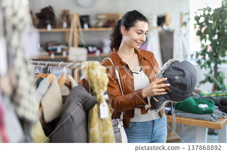 Armenian woman chooses a gray fur hat 137868892