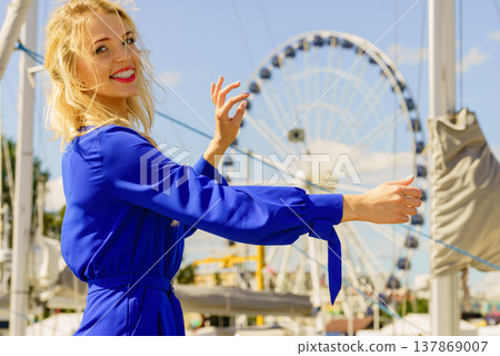 Fashion model and ferris wheel Fashion model and ferris wheel 137869007