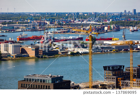 Aerial view of Port of Rotterdam in middle of Rhine-Meuse-Scheldt delta Aerial view of Port of Rotterdam in middle of Rhine-Meuse-Scheldt delta 137869095