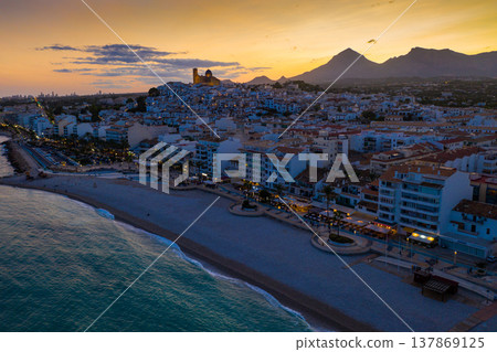 Aerial view of Altea cityscape on Mediterranean coast at twilight, Spain Aerial view of Altea cityscape on Mediterranean coast at twilight, Spain 137869125