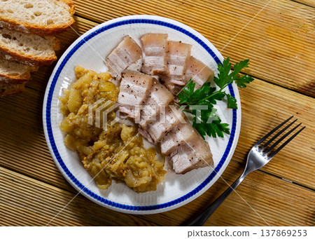 Pork served with stewed eggplant on plate Pork served with stewed eggplant on plate 137869253