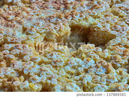 Macroscopic view of sulfur crystals with a porous structure Macroscopic view of sulfur crystals with a porous structure 137869381