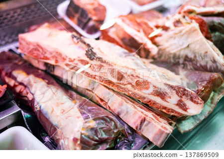 Chopped beef meat in metal trays displayed for sale Chopped beef meat in metal trays displayed for sale 137869509